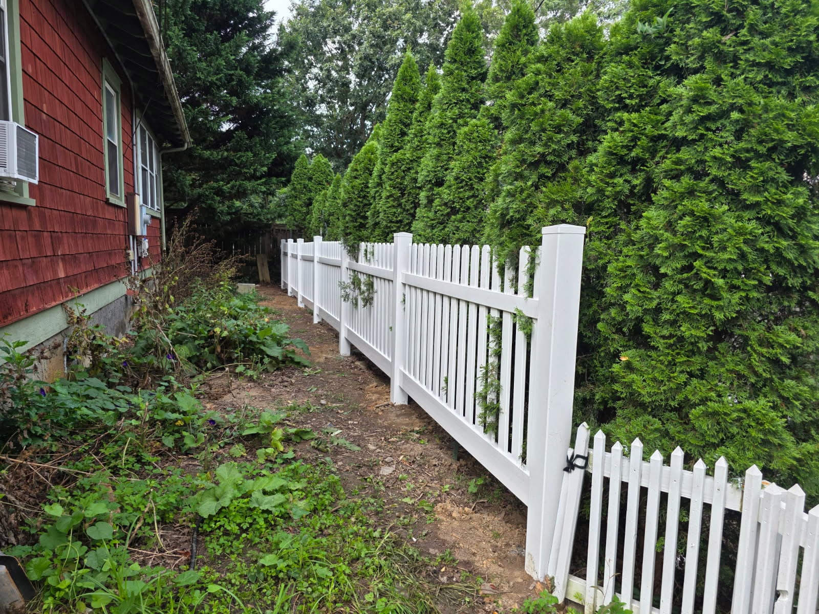 Vinyl picket fence installation